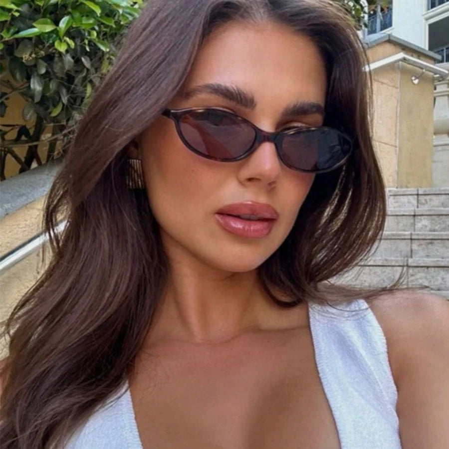 Model wearing the Lola Oval Sunglasses
