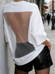 Model wearing the Eden Fishnet Mesh Top