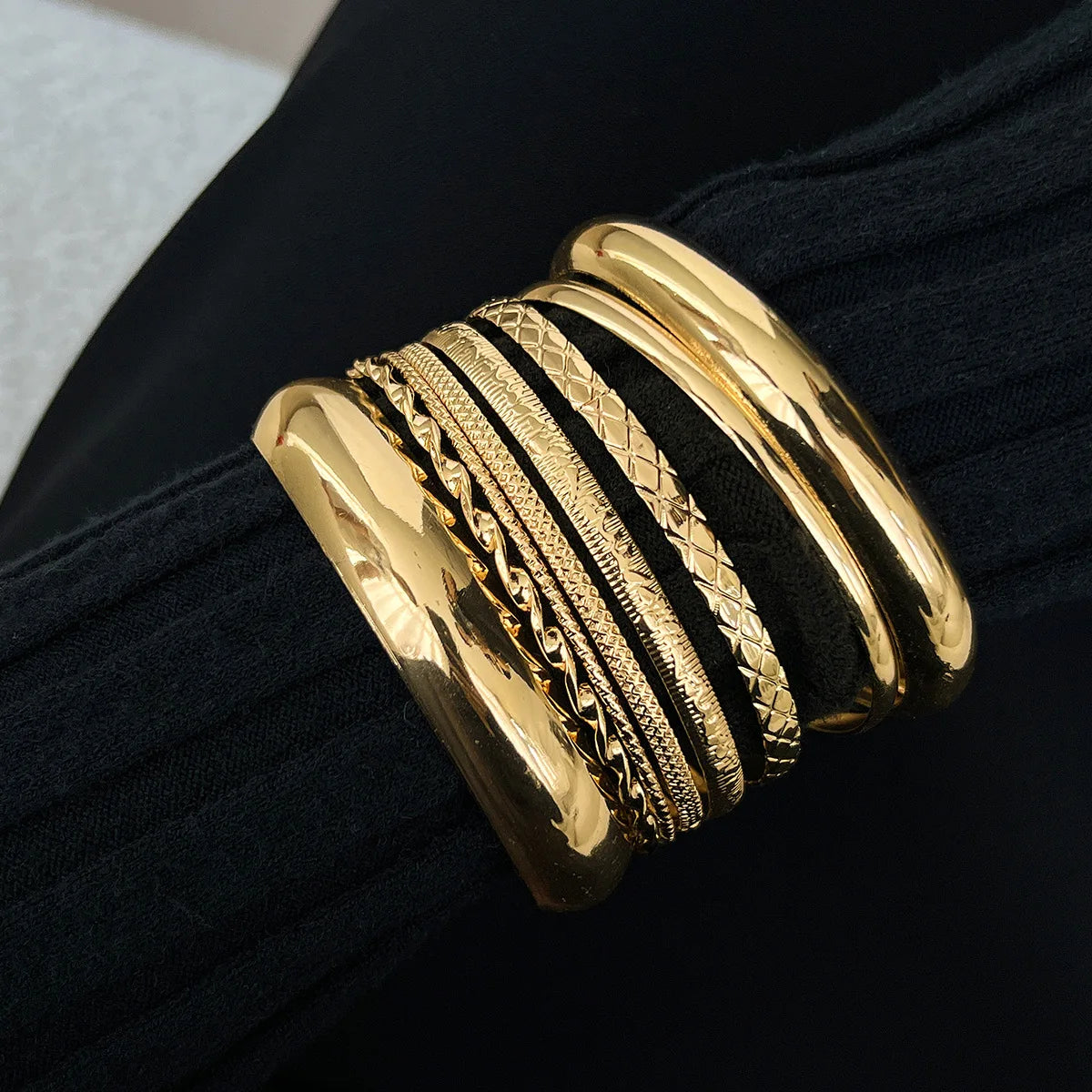 Model wearing the Maren Textured Bangle Set