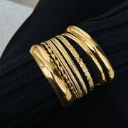 Model wearing the Maren Textured Bangle Set