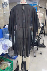 Model wearing the Seraphina Sheer Chiffon Cape