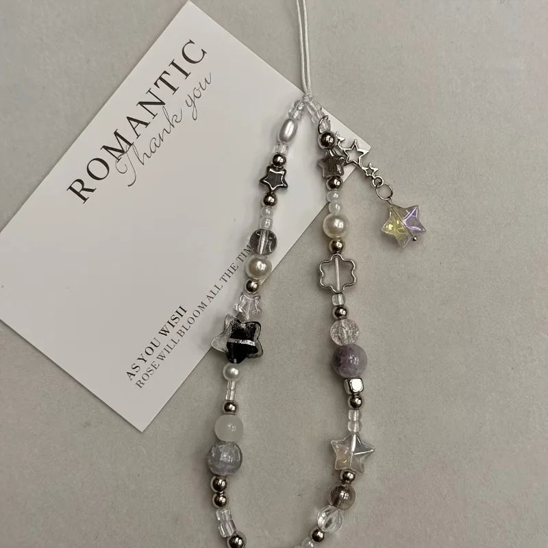 Model wearing the Nova Star Pearl Phone Charm