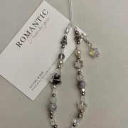 Model wearing the Nova Star Pearl Phone Charm