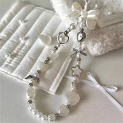 Model wearing the Colette Baroque Phone Charm