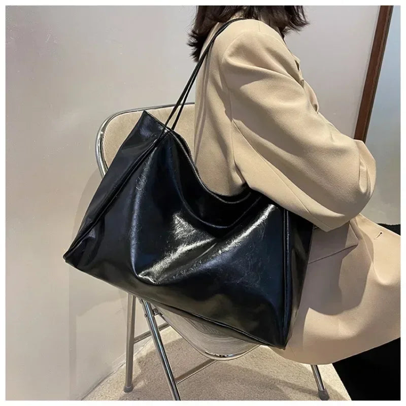 Model wearing the Priya Soft Shoulder Bag