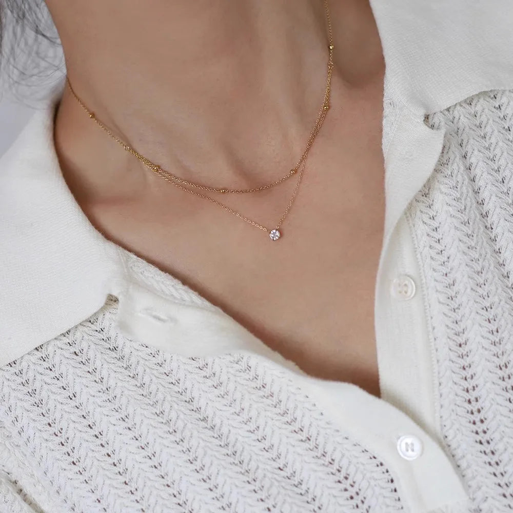 Model wearing the Cassia Layered Crystal Necklace
