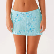 Model wearing the Amara Sequin Pearl Mini Skirt