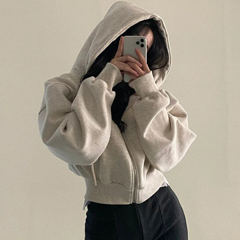Model wearing the Nola Cropped Zip Hoodie