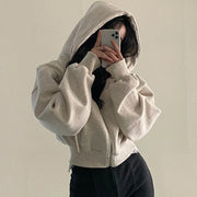 Model wearing the Nola Cropped Zip Hoodie