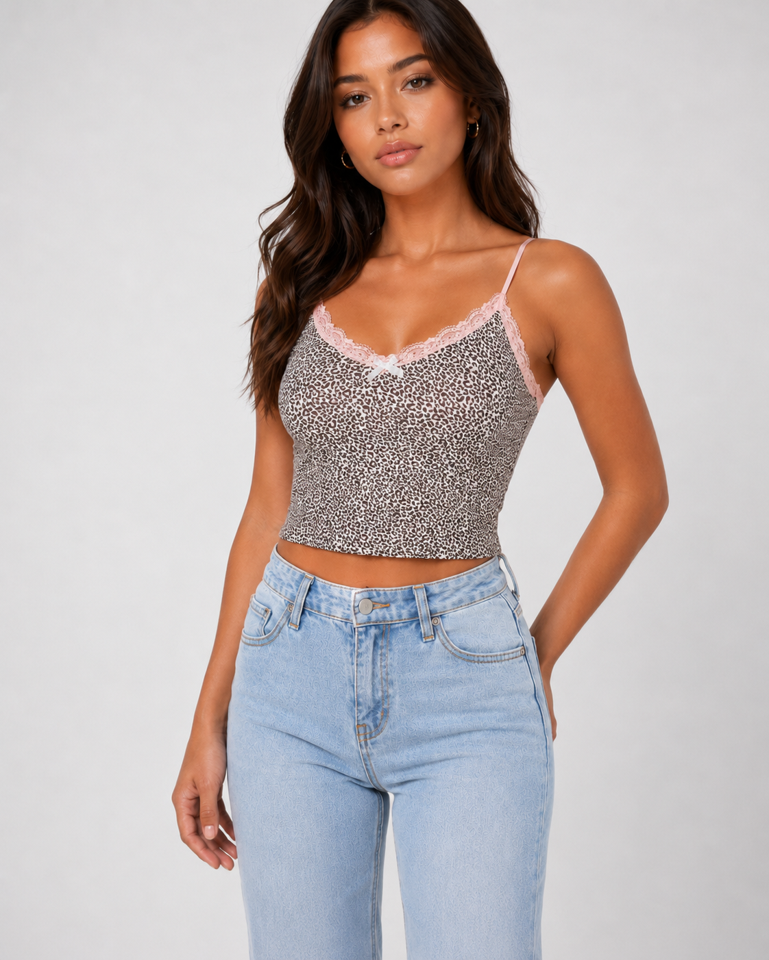 Model wearing the Leni Leopard Lace Cami with pink lace trim, angled view