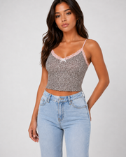 Model wearing the Leni Leopard Lace Cami with pink lace trim, angled view
