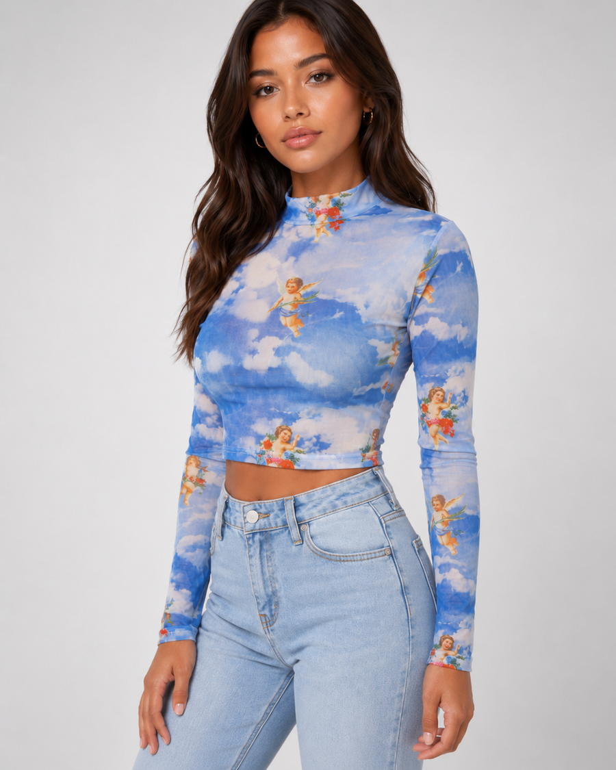 Model wearing the Zadie Sheer Mesh Top in blue cherub print
